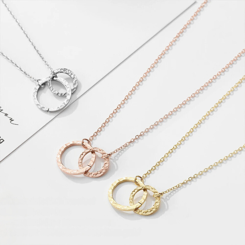 Collier avec pendentif à double créole